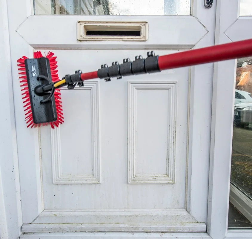 Front door cleaned with a water-fed pole brush