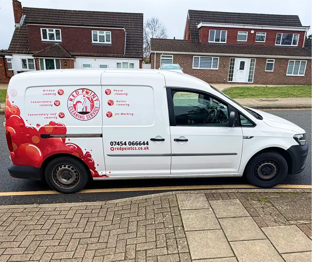 Red Point Cleaning Service van outside a home in Bromley